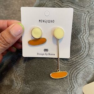 asymmetrical earrings